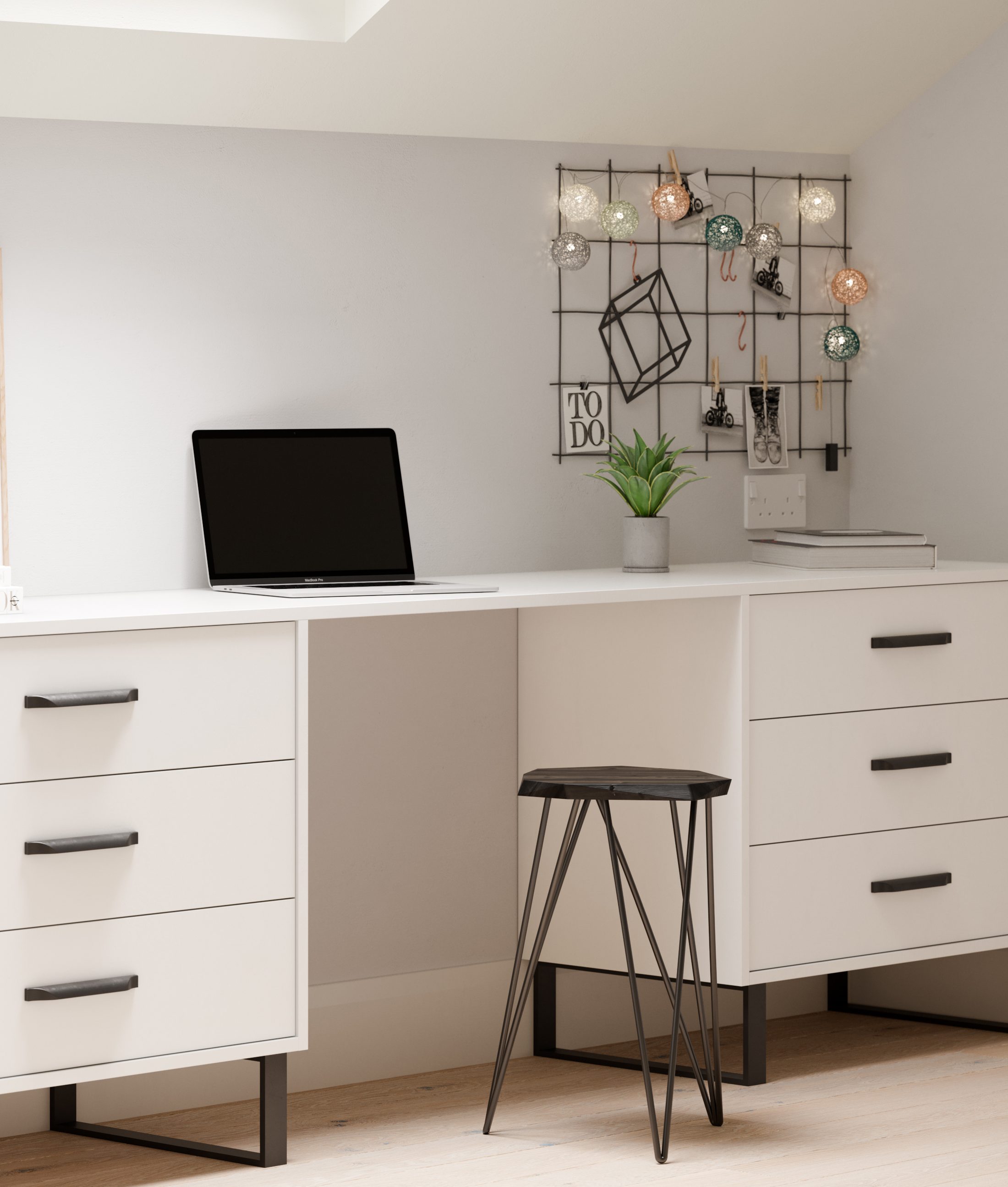 Fitted workstation surface with laptop, drawers and stool