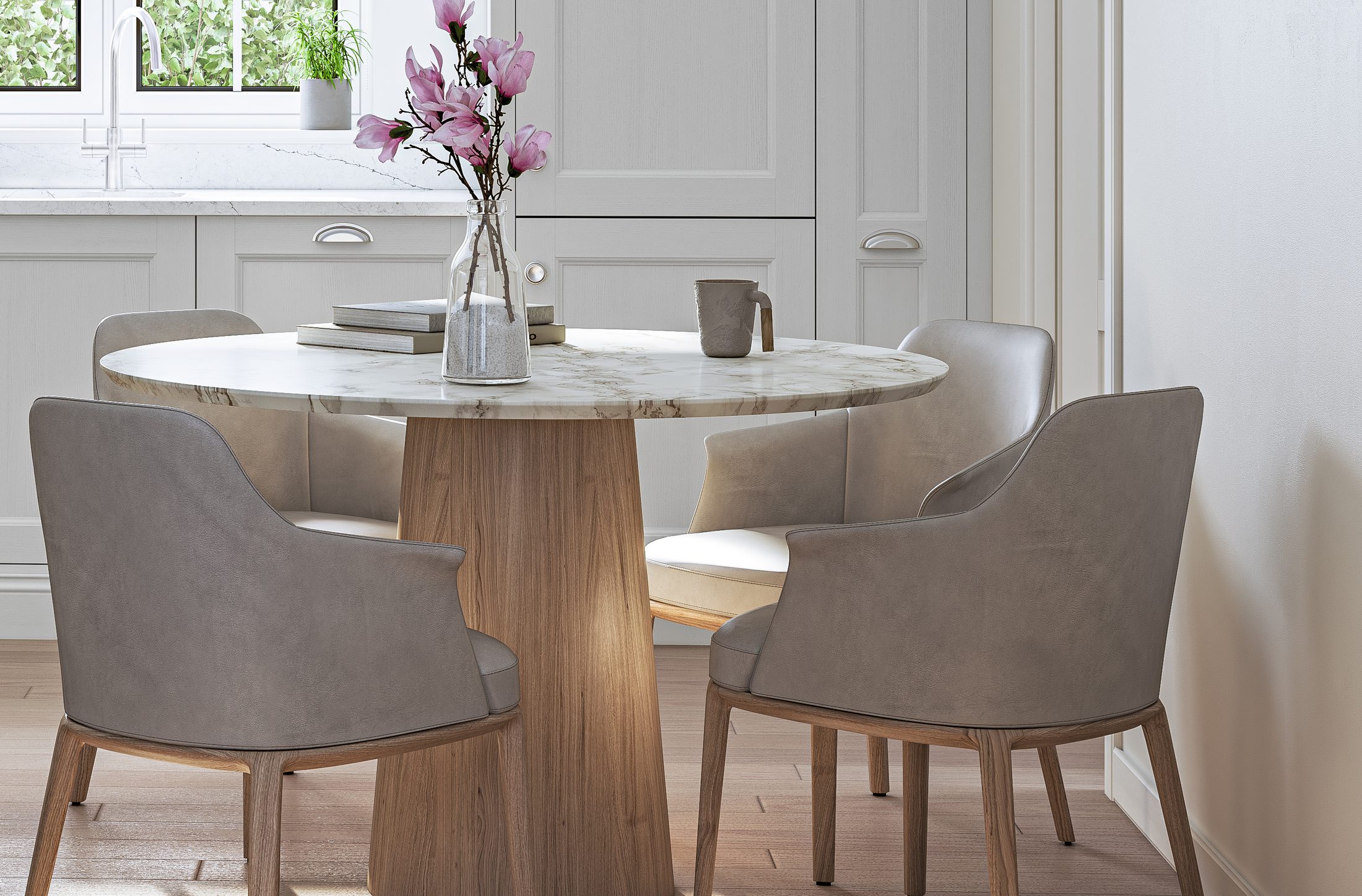 Upholstered chairs around a small round table